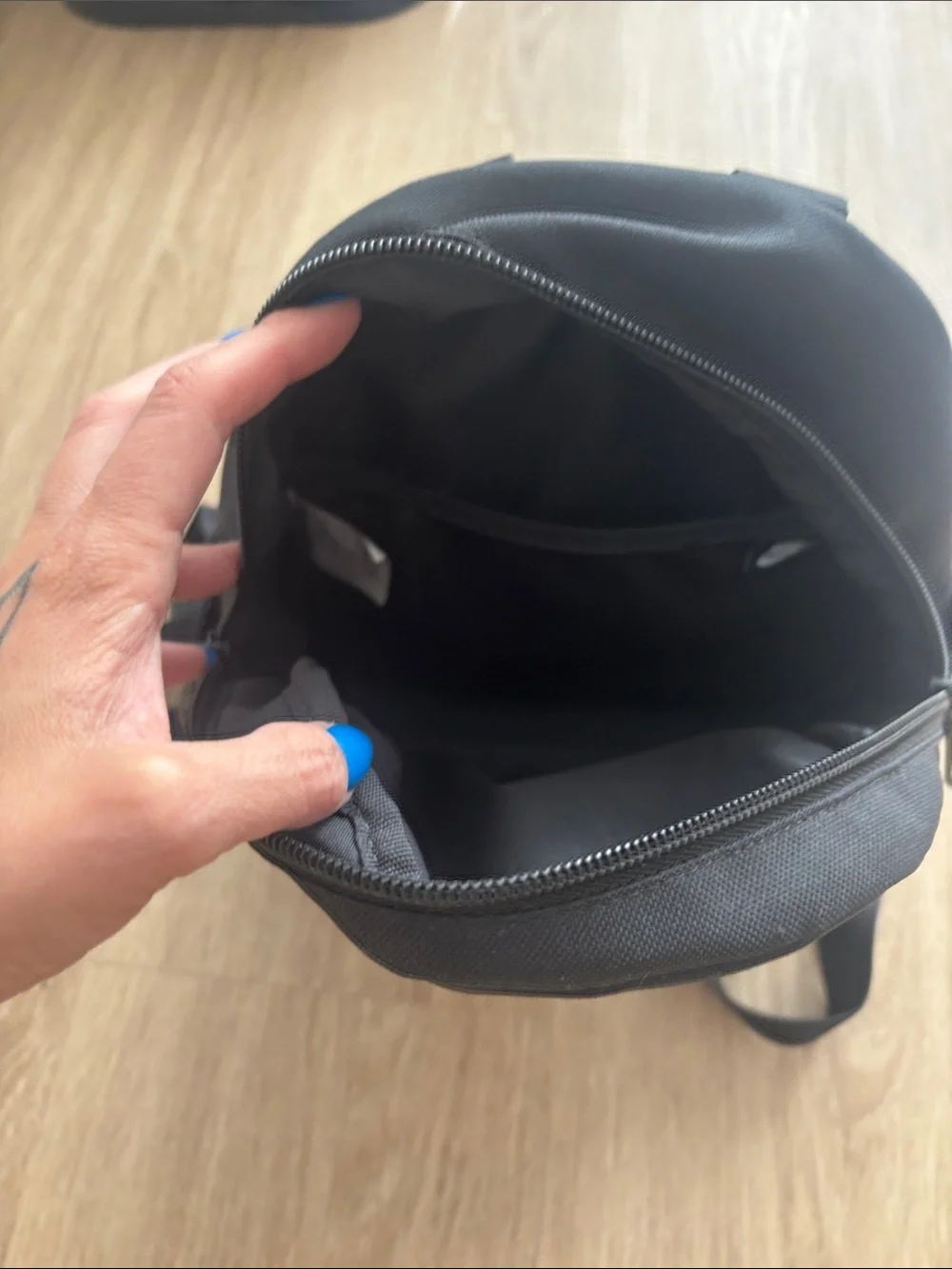 Nike Black Mini Backpack with White Swoosh Logo